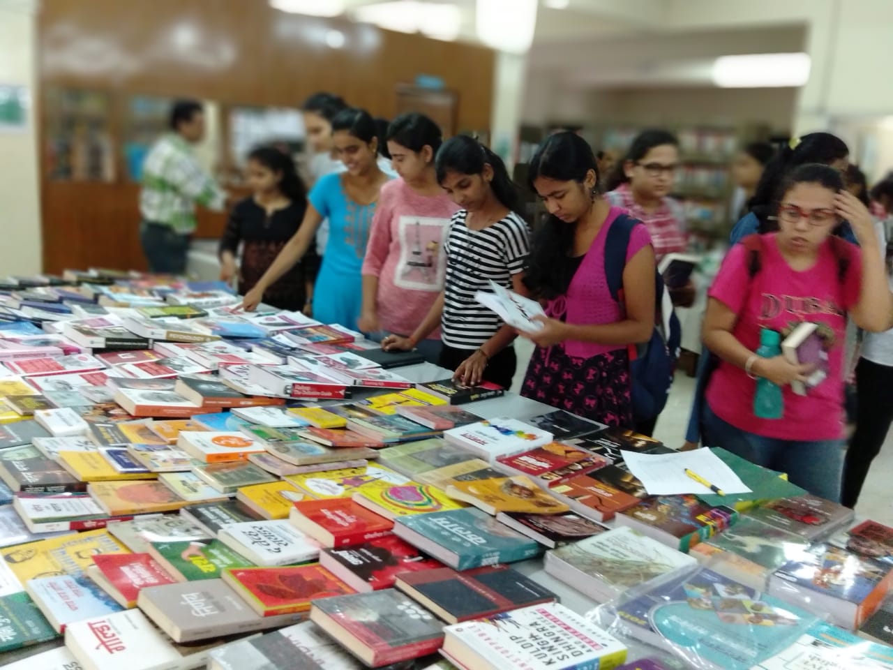 Visitors having a look at the huge collection of books